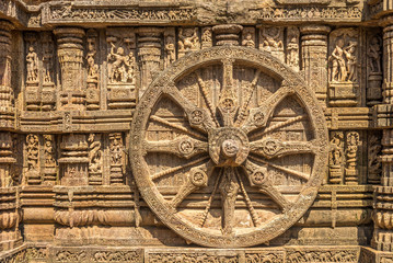 Veew at the decorative stone relief wheels of Konark Sun Temple in India, Odisha