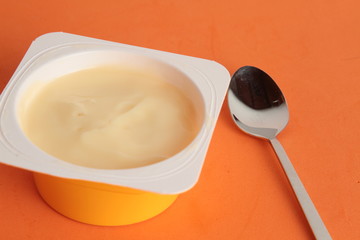 custard packed in plastic container