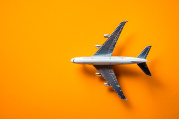 Model plane, airplane isolated on yellow background