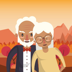 cute grandparents couple lovers in the sunset landscape