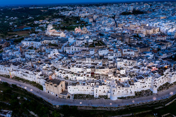 aerial view at dusk, Mountain village, Ostuni, Apulia, Southern Italy
