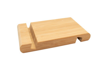 Wooden stand for smartphone isolated on white background. Side view.