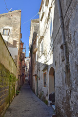 A small street among the old houses of Sessa Aurunca, a medieval village in the province of Caserta