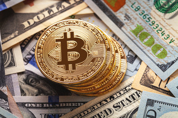 golden bitcoin coin on us dollars close up. Electronic crypto currency - obrazy, fototapety, plakaty