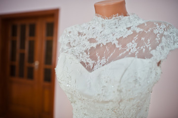 Elegant white wedding dress at bride morning.