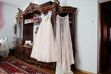 Elegant white wedding dress at bride morning.