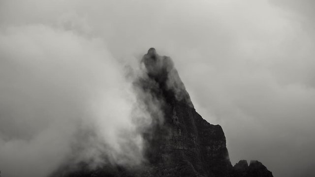 Timelapse Mt Rotui in Moorea, French Polynesia. Close up of clouds moving past mountain peak