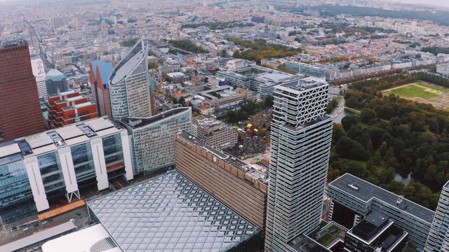 Aerial Drone view of Den haag centraal train station during climate strike protests