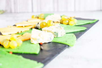cheese platter on a cutting Board