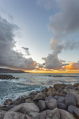 Fototapeta na wymiar Cloudy sunset on the sea.