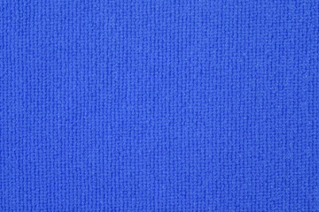 Close up of blue colored wool textile texture abstract background