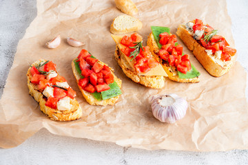 Italian bruschetta with cheese and tomatoes