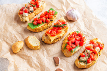 Italian bruschetta with cheese and tomatoes