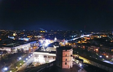 Gediminas' tower and Vilnius downtown at night. Drone footage.