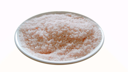 Isolated pink salt in white background. Pink salt is one of rock salt from Asia and be used wildly for good healthy.