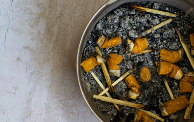 ashtray and cigarette