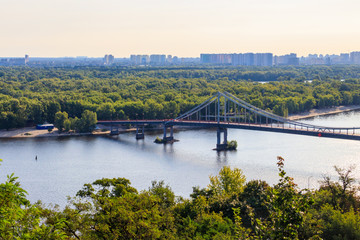 View on pedestrian bridge across the Dnieper river in Kiev, Ukraine