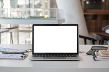 Fototapeta premium modern office workspace desk with blank screen laptop computer and office supplies