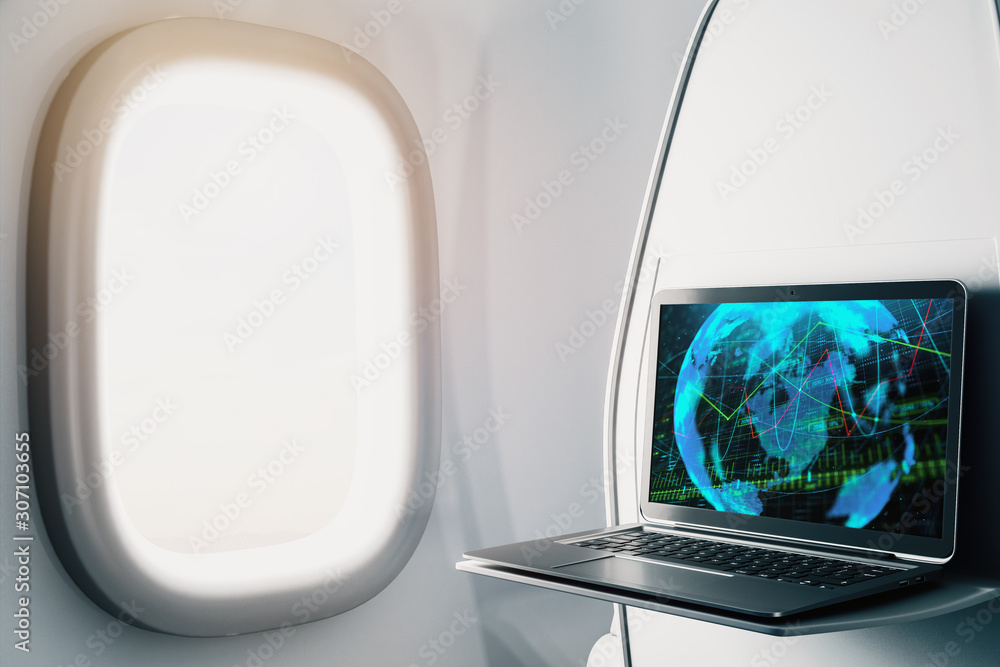 Poster laptop closeup inside airplane with forex graph and world map on screen. financial market trading co