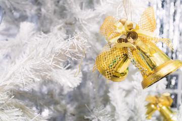 Christmas Tree with golden Bell and Gold Background