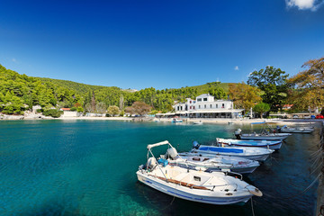 Fototapeta na wymiar The port in Agnontas of Skopelos, Greece