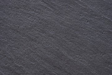 Black stone texture background, banner size with copyspace .