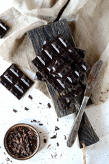 Dark chocolate on a gray background