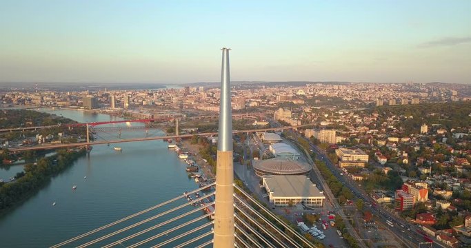 Aerial view of Ada bridge and Sava river in Belgrade during sunset