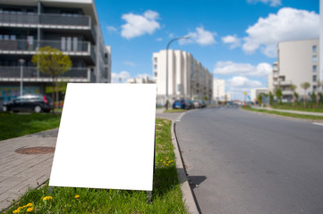 Blank standing banner for advertisement on the residential area background