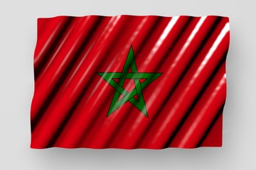 wonderful shining flag of Morocco with big folds lying isolated on grey - any occasion flag 3d illustration..