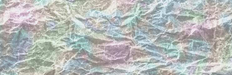 Background color crumpled paper panorama. View from above.