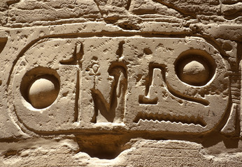 Carved in stone hieroglyphs close view in Karnak Temple Complex