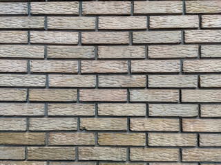 Yellow standard bricks found on building walls with even pattern and rough texture, cool wallpaper...