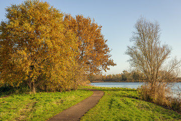 Curved path next to a lake