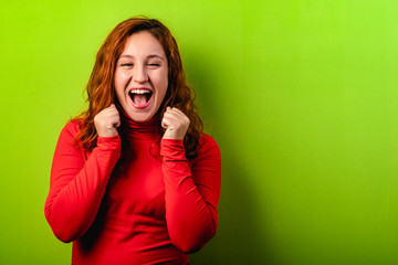 funny surprised girl showing empty copy space