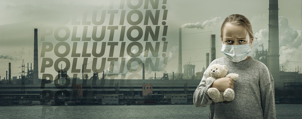 Caucasian little girl wearing the respiratory protection mask against air pollution, dust particles exceed the safety limits because of fuming factories. Healthcare, environmental, ecology concept.