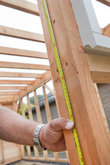 Carpenter. Construction site.Wooden construction. Frame.. Building a barn