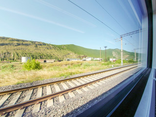 Fototapeta na wymiar view from the window of a train car passing