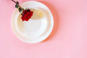 Romantic table setting for Valentines day or dinner date celebration wedding.