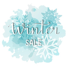Winter sale banner. Vector illustration. Ink freehand calligraphy. Winter lettering design. Winter Sale card. Christmas sale. New Year card. Snowflakes