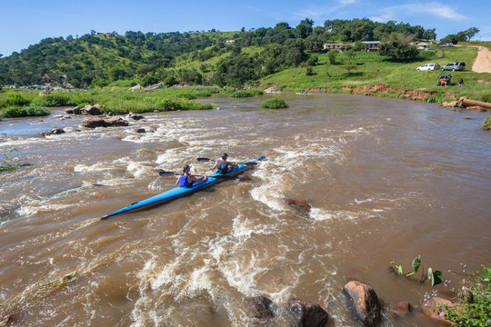 River Canoe Kayak Race Doubles Women Overhead Photo Paddling Water Rapids Rural Landscape