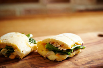 Panini sandwich with salad on plate 