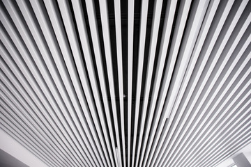 Black and white celling. Parallel lines. background 
