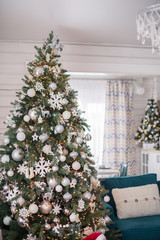christmas tree decorated in the house december new year interior living room white toys