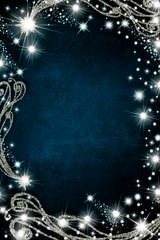 Blue luminous background with stars and silver