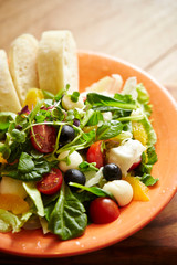 Mozzarella cheese salad with bread 