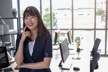 Office lady is beautiful asian in modern office