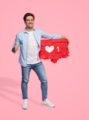 Cheerful man recommending social media