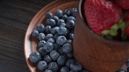 Blueberries and strawberries in the process of making American pie. homemade baking