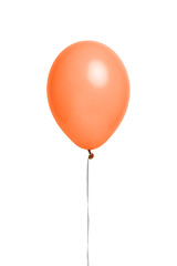 Orange helium balloon on white background.